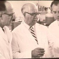 Dr. Shaklee and two sons in lab 1950's