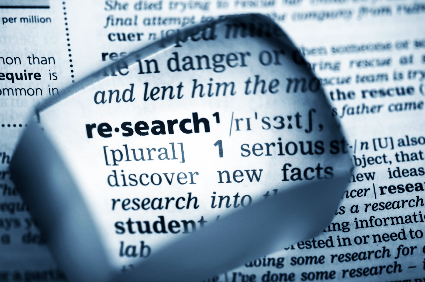 word "research" magnified on page