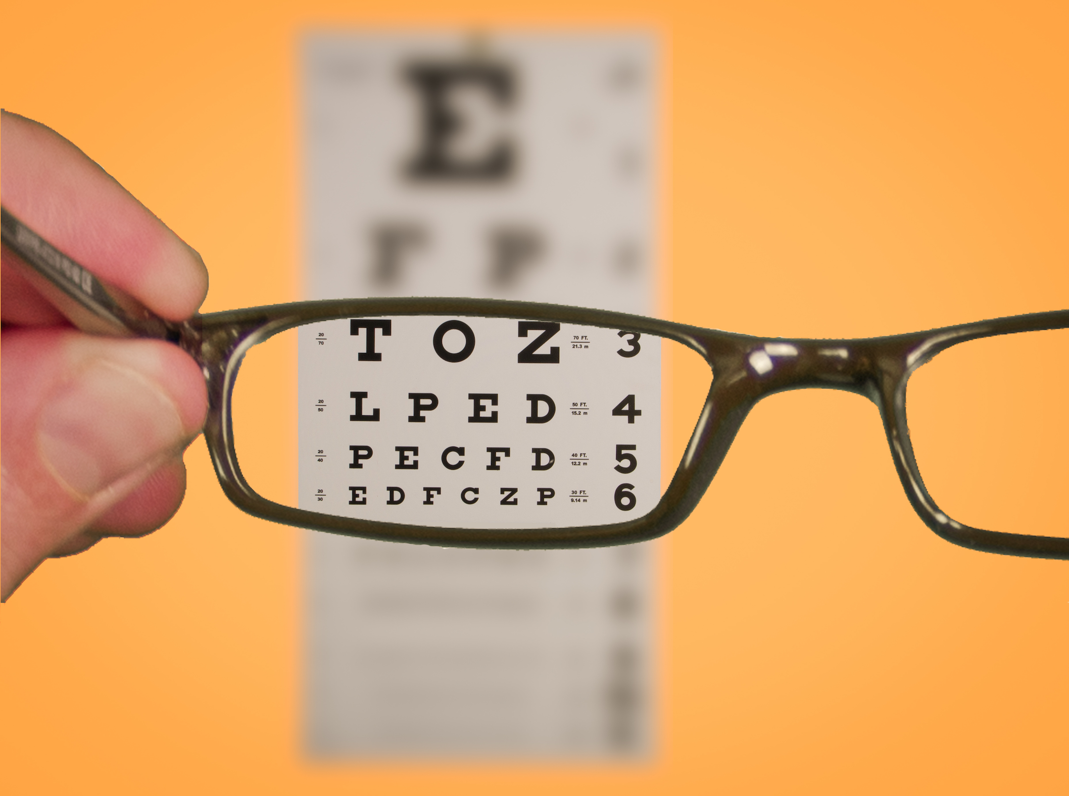 lens brings eye chart into focus